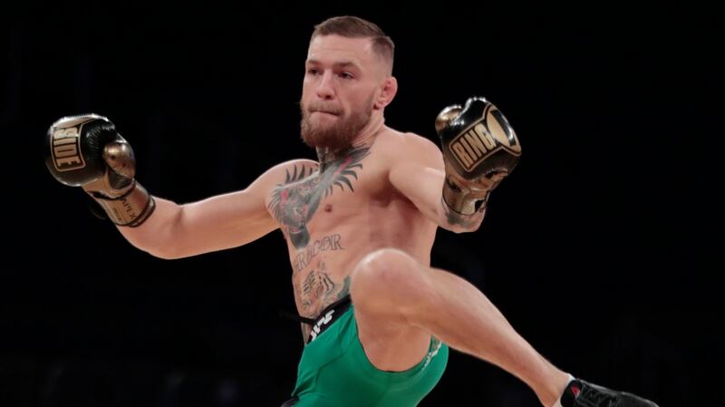 Conor McGregor shows off for the crowd at the open workouts in Madison Square Garden ahead of his UFC 2005 title fight. Photograph: Julio Cortez/AP 