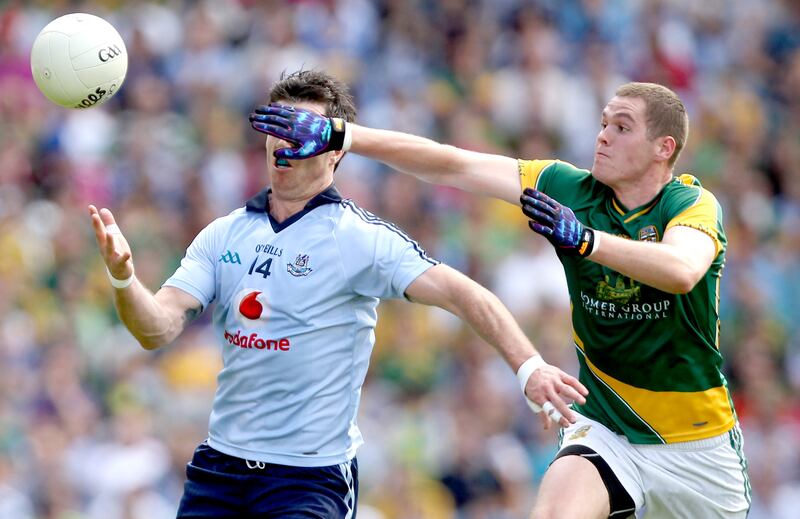 Dublin's Michael Darragh MaCauley and Bryan Menton of Meath in action in 2012. Photograph: James Crombie/Inpho