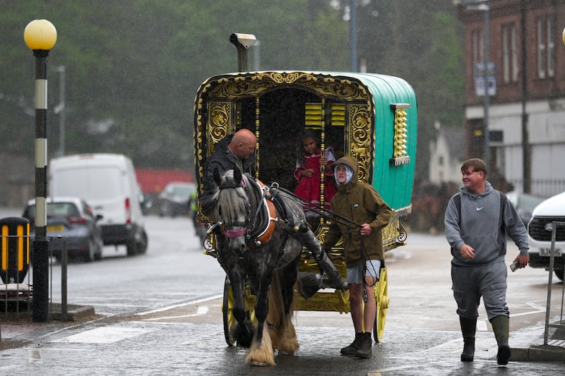 A traditional horse-drawn caravan makes its way to the annual Appleby Horse Fair. Photograph: Christopher Furlong/Getty Images