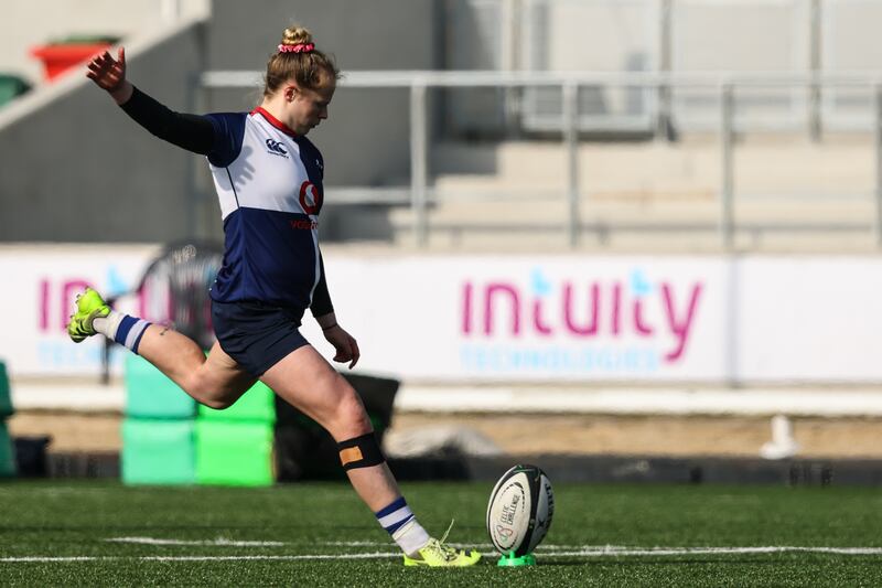 Dannah O'Brien uses a pronged tee with the ball low to the ground. Photograph: Ben Brady/Inpho