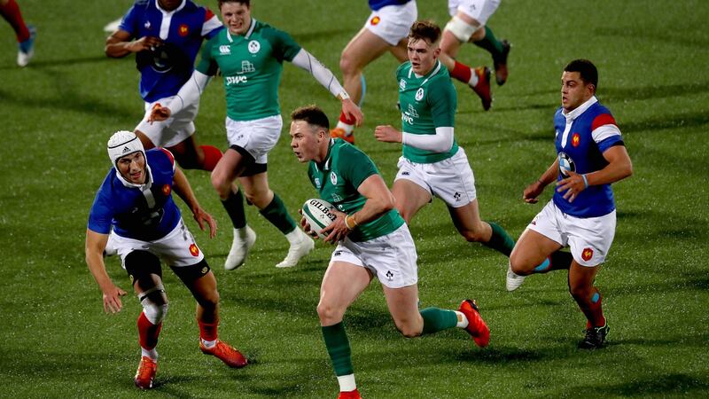 Ireland’s Sean French makes a break against France. Photograph: Ryan Byrne/Inpho