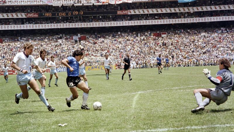 Diego  Maradona scores against England during the 1986 World Cup in Mexico. Photograph: AFP via Getty Images