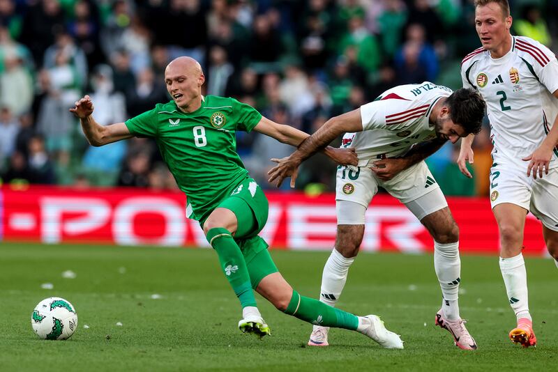 Ireland's Will Smallbone and Hungary's Dominik Szoboszlai. Photograph: Morgan Treacy/Inpho
