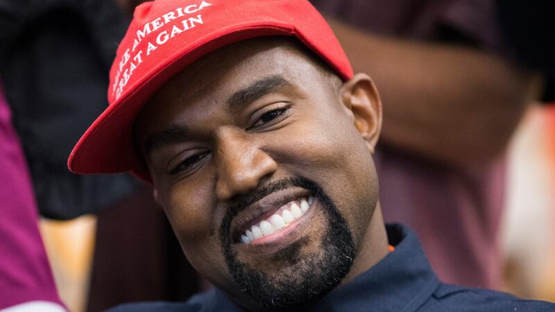 Kanye West at a meeting with US president Donald Trump in the White House in October 2018. The rapper says he no longer wears the red had or supports Trump. Photograph: Michael Reynolds/EPA