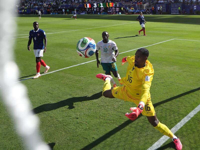 France goalkeeper Mike Maignan saved off the line. Photograph: Kevin C Cox/Getty
