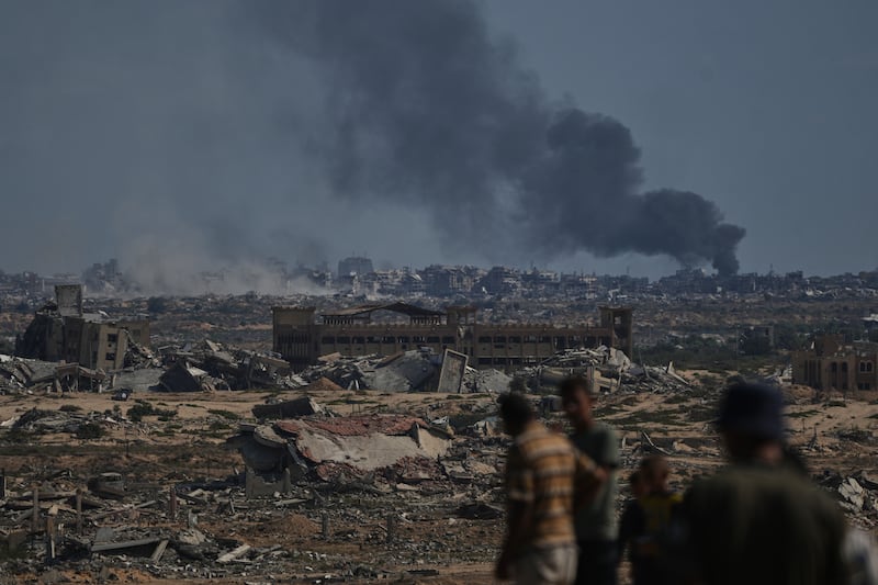 Smoke rises following an Israeli military strike in Gaza City on Thursday. Photograph: Abdel Kareem Hana/AP