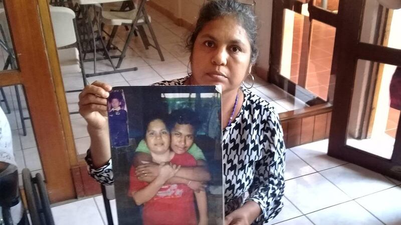 Margaret Munguía, in Managua, holding a picture of herself with her son Javier, who was killed in May 2018. Photograph:  Michael McCaughan