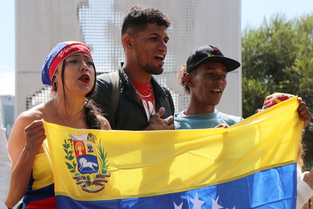 Venezuelans living in Ecuador celebrate in Quito on Saturday after US forces captured Venezuelan leader Nicolás Maduro. Photograph: Galo Paguay/AFP via Getty Images