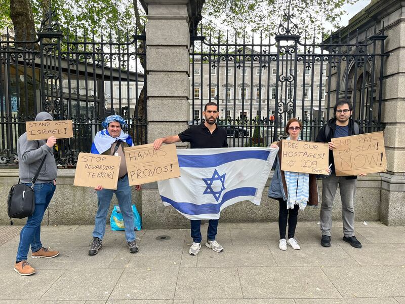 From left to right: Cormac, who declined to give his second name or be photographed; Guy Serbin; Enosh Hortig; Lior Tibet; and Shai Kabiri protesting outside the gates of Leinster House on Wednesday morning. Photograph: Jack Horgan-Jones
