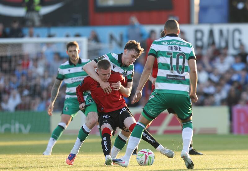 Ross Tierney of Bohemians is challenged by Matthew Healy of Shamrock Rovers in Dalymount Park on Monday. Photograph: Tom Maher/Inpho