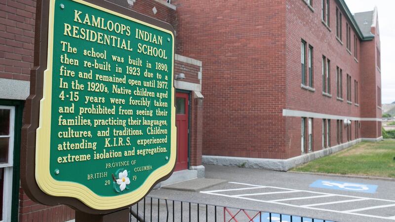 A plaque is seen outside the former Kamloops Indian Residential School on Tk’emlups te Secwpemc First Nation in Kamloops, British Columbia, Canada. Photograph: Andrew Snucins/The Canadian Press/AP.