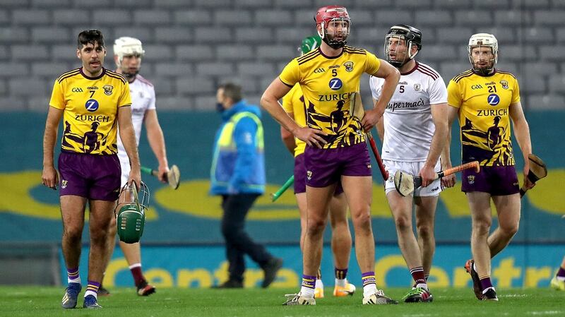 Wexford’s Shaun Murphy and Paudie Foley leave the pitch at the end of the game. Photo: Bryan Keane/Inpho