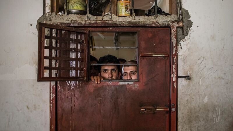 Suspected Islamic State members imprisoned just south of Mosul, Iraq, July 22nd, 2017. Ivor Prickett/The New York Times