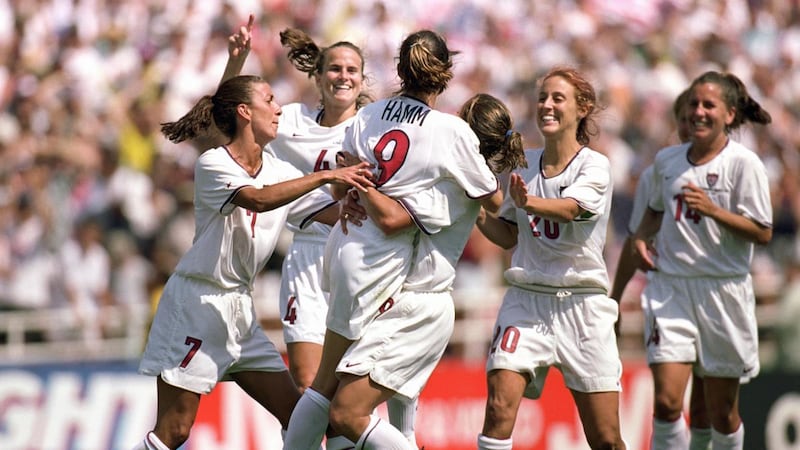 Mia Hamm and teammates celebrate after the USA’s World Cup win over China in 1999. Photograph: Jed Jacobsohn/Getty