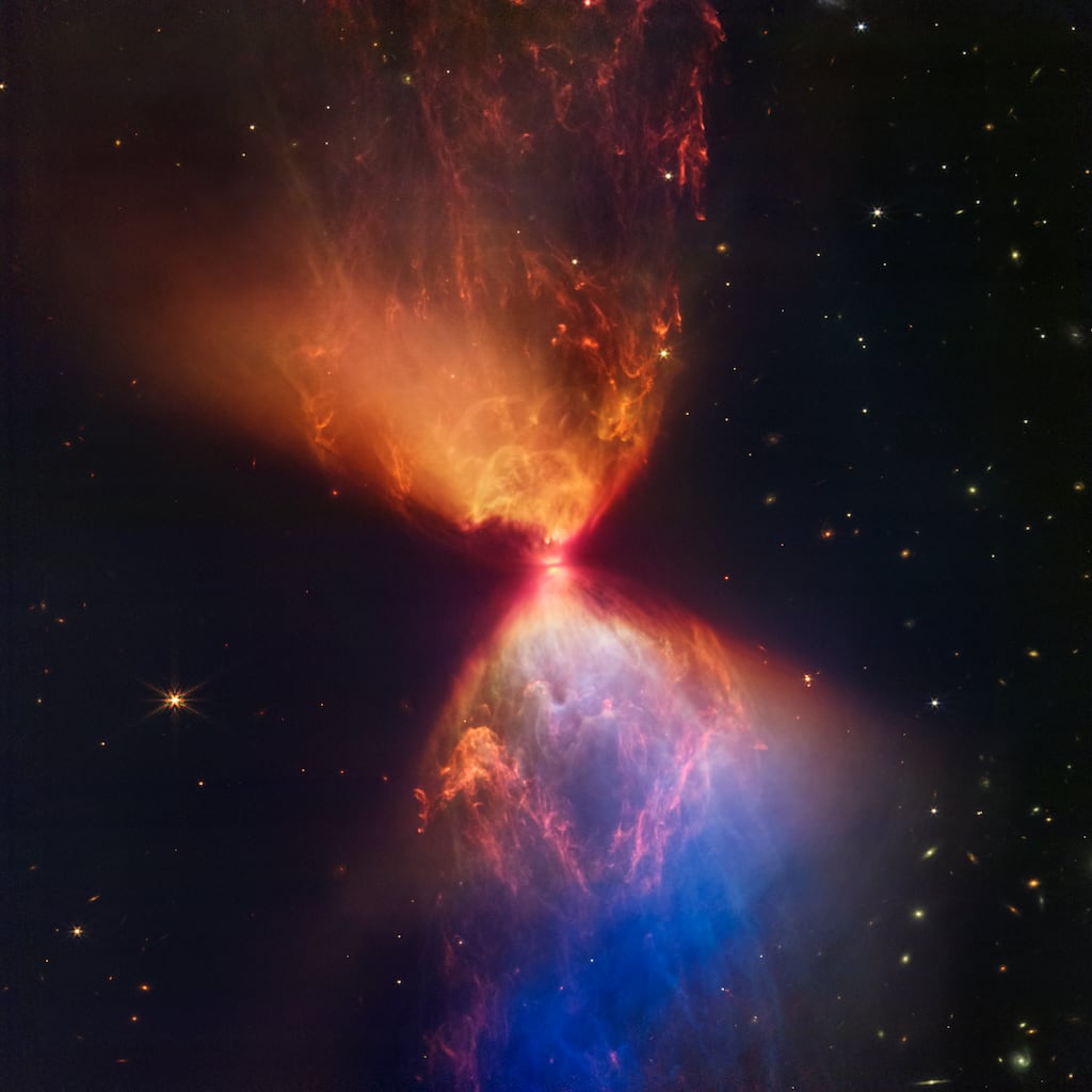 A protostar within the dark cloud L1527 embedded within a cloud of material feeding its growth, captured by the James Webb Space Telescope. Photograph: AP/PA