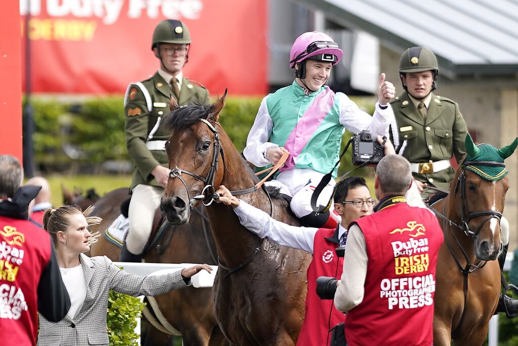 Jockey Colin Keane celebrates after winning the Irish Derby with horse Westover. Photograph: Niall Carson/PA