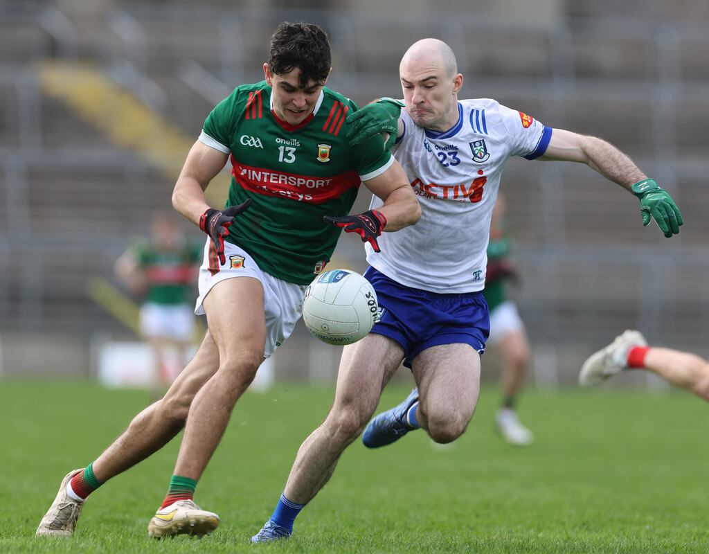 Monaghan's Kevin Loughran tackles Tommy Conroy of Mayo during the Allianz Football League Division One game at St Tiernach's Par in Clones. Photograph: Lorraine O’Sullivan/Inpho
