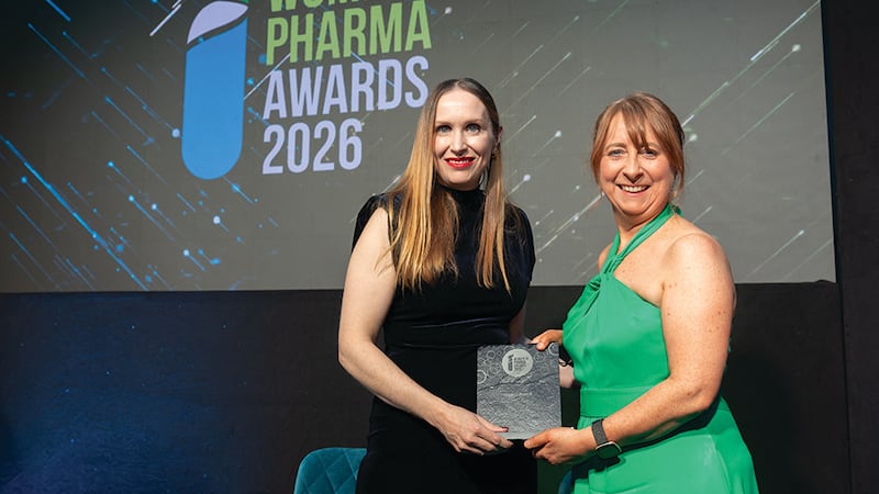 Aoife Callan, awards judging co-ordinator, presents the legacy award to Jean Casey