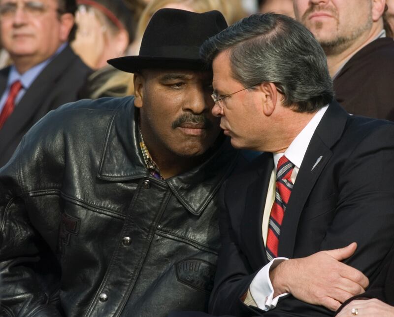 Rahaman Ali talks to Kentucky Governor Ernie Fletcher during the dedication of the Muhammad Ali Center in Louisville, Kentucky, in 2005. Photograph: David R. Lutman/Getty Images