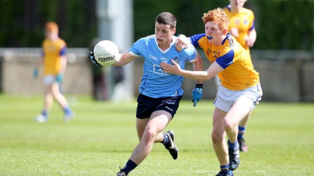 Ross McGarry is challenged by Kian Gilmore during Dublin’s Leinster MFC win over Longford. Photograph: Oisin Keniry/Inpho