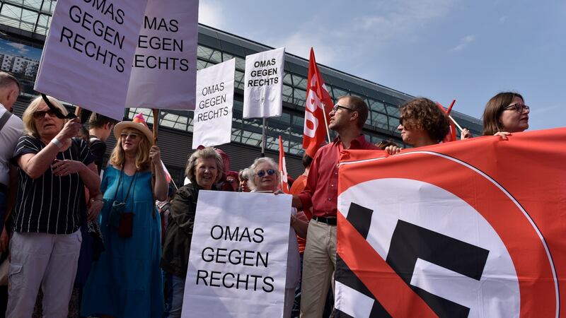 Women with placards that read “Grandmas against the right wing”. Photograph: EPA