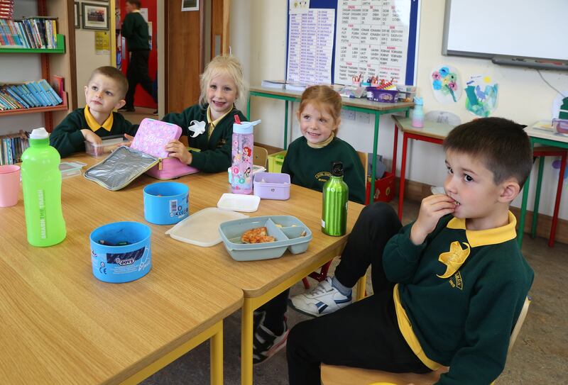 Ukrainian pupils during lunch break in Scoil Cholmáin, Muighinis, Carna, Co Galway.  Photograph: Joe O'Shaughnessy
