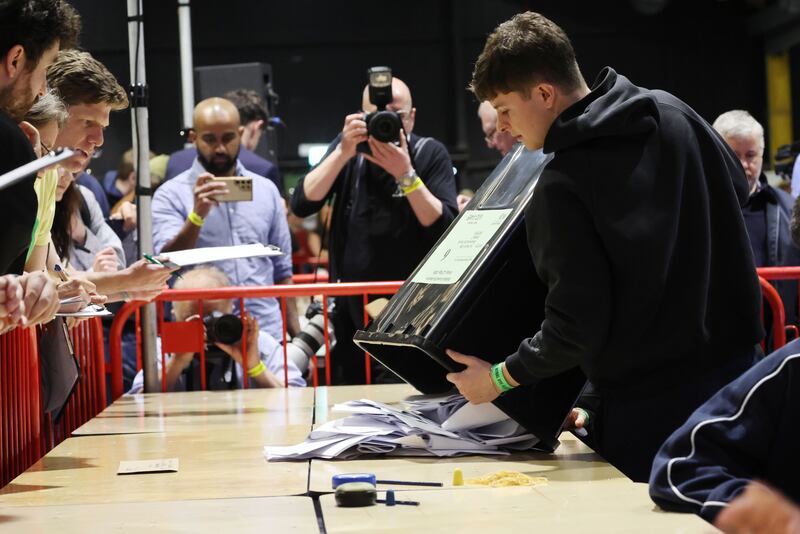 The first ballot boxes are opened at the start of counting in the Dublin Central by-election at Dublins RDS.
Photograph: Alan Betson / The Irish Times
