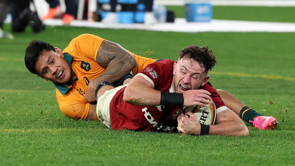 Hugo Keenan dives over to score the last-minute, match-winning try for the Lions. Photograph: David Rogers/Getty Images
