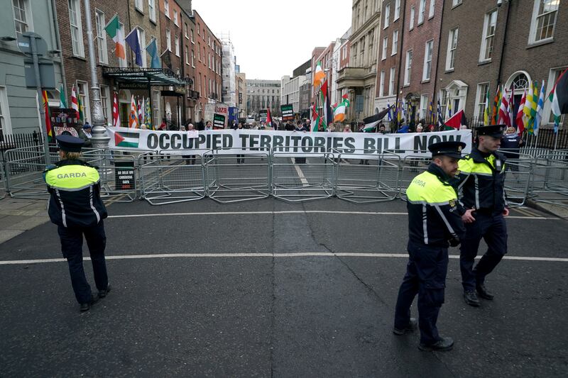 Drama inside Leinster House aside, pro-Palestinian protesters gathered outside calling for incoming Government to pass the Occupied Territories Bill. Photograph: Brian Lawless/PA Wire