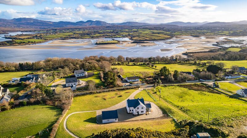 The view from the elevated site all across the estuary in Sheephaven Bay with Muckish mountain to the right at Aghalattive, Ards, Creeslough, Co Donegal