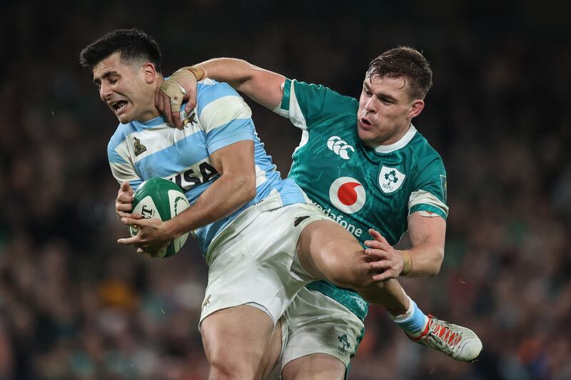 Argentina's Tomas Albornoz is challenged in possession by Ireland's Garry Ringrose. Photograph: Ben Brady/Inpho