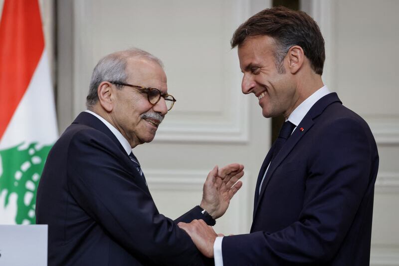 Lebanon's prime minister Nawaf Salam shakes hands with France's president Emmanuel Macron at a joint press event following their meeting at the Elysee presidential palace in Paris on April 21st. Photograph by Ludovic Marin/AFP via Getty Images