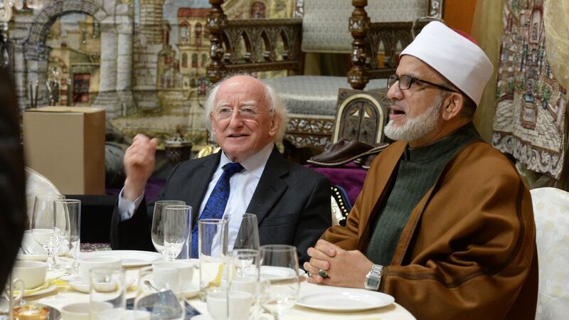 President Michael D Higgins dining with Sheikh Hussein Halawa, imam at the Islamic Cultural Centre in Clonskeagh. Photograph: Cyril Byrne