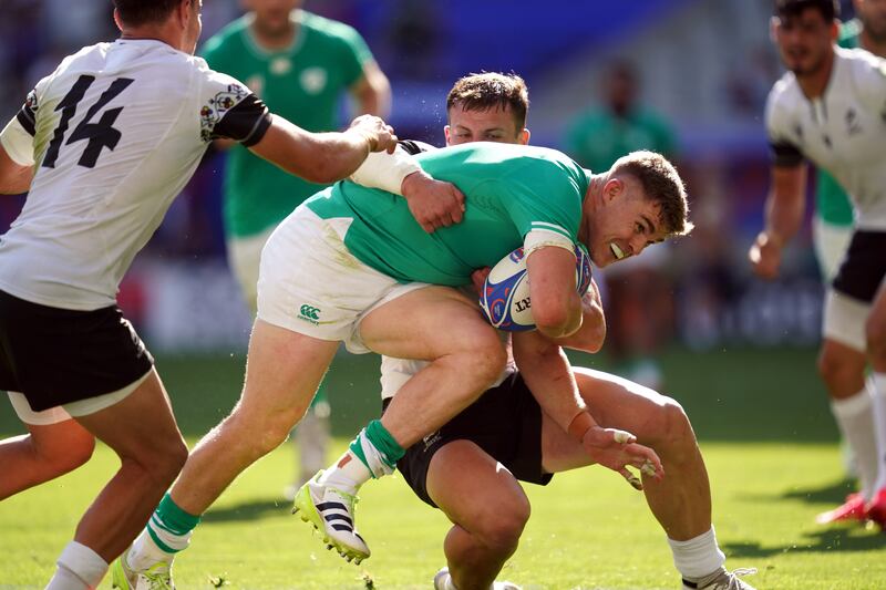 Ireland's Garry Ringrose is tackled during the Rugby World Cup Pool B match against Romania the Stade de Bordeaux. Photograph: David Davies/PA Wire