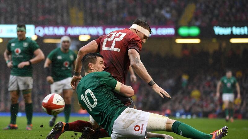 Johnny Sexton tackles Dan Biggar. Photo: Paul Ellis/Getty Images