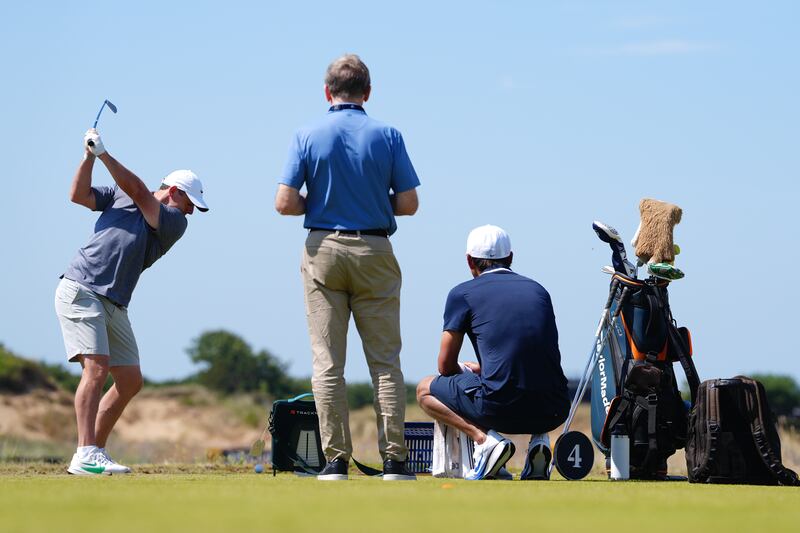 Rory McIlroy with coach Michael Bannon and caddie Harry Diamond at Royal Birkdale on Monday. Photograph: David Davies/PA
