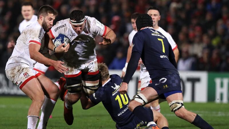 Ulster’s Marcell Coetzee is tackled  by Clermont Auvergne’s Jake McIntyre during the  Heineken Champions Cup game at Kingspan stadium in Belfast. Photograph: Brian Lawless/PA Wire