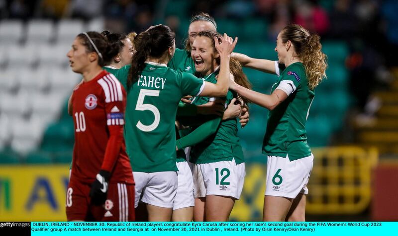 Ireland players congratulate Kyra Carusa after she scored the second goal of the World Cup qualifier against Groegia at Tallaght Stadium. Photograph:  Oisín Keniry/Getty Images