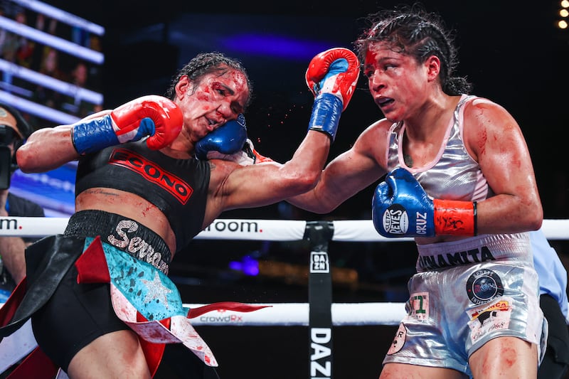 Amanda Serrano and Erika Cruz in action at Madison Square Garden on Saturday. Photograph: Inpho/Matchroom Boxing/Ed Mulholland                                                             