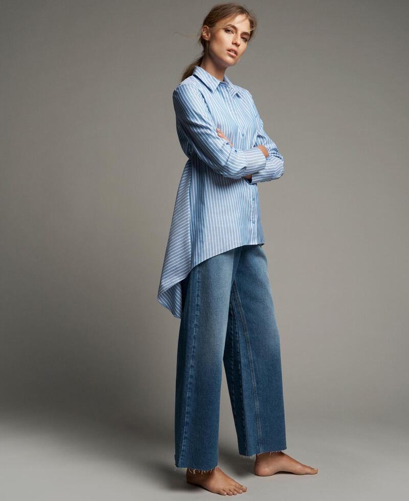 This flared shirt covers the posterior and look good with jeans. Shirt €55, jeans €53 from M&S spring collection.