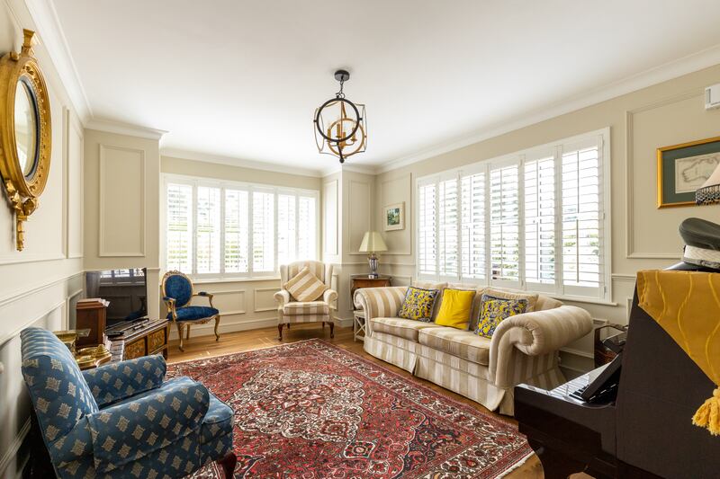 A formal living room lies to the front. Photographs: Ed Place