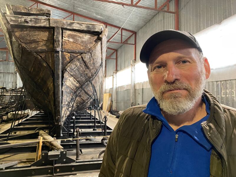 Dmytro Kobaliia, head archaeologist at the Khortytsia National Reserve (KNR) in the hangar where the KNR stores its best antique boats. Photograph: Lara Marlowe