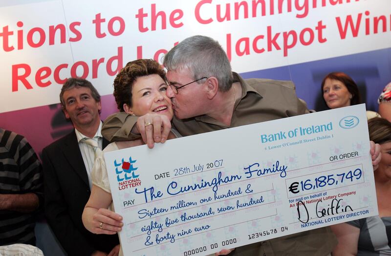 Paul and Helen Cunningham, from Fairhill, Cork, collect a cheque for what was then a record jackpot prize of more than €16.1m in August 2007. Photograph: Eric Luke