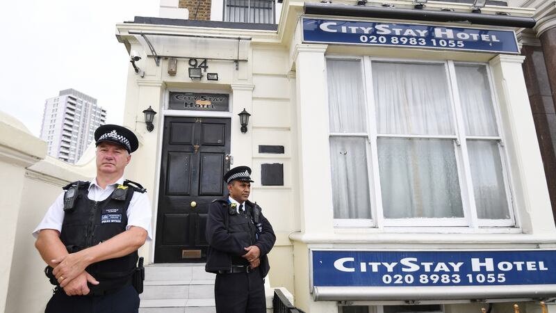 Police stand guard outiside the City Stay hotel in Bow, east London on Wednesday where Russians Alexander Petrov and Ruslan Boshirov stayed during the Salisbury poison attack and where traces of Novichok nerve agent where found in a room. Photograph: Facundo  Arrizabalaga/EPA
