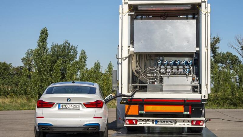 Refuelling a test car with hydrogen from a truck mounted filling station