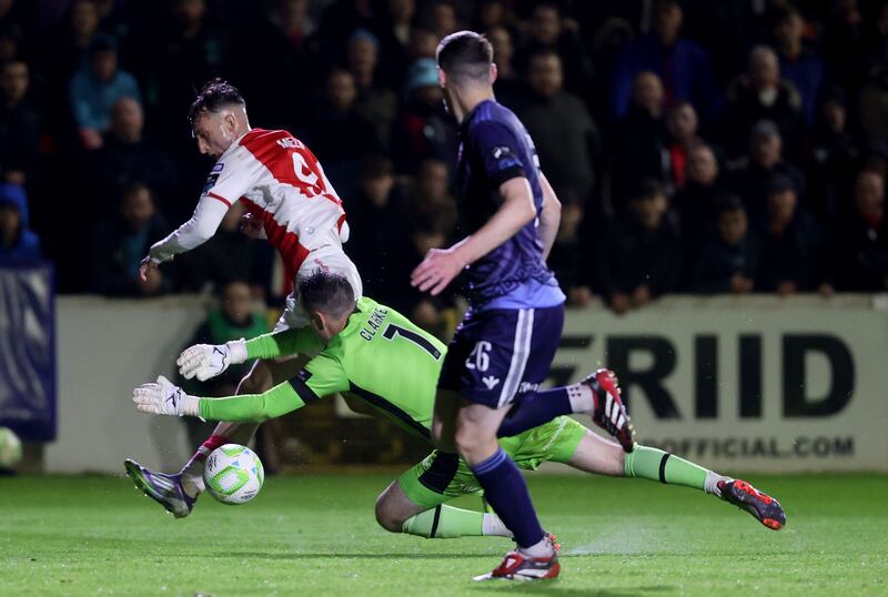 St Patrick's Athletic's Mason Melia has a shot saved by Galway United goalkeeper Brendan Clark at Richmond Park. Photograph: Bryan Keane/Inpho