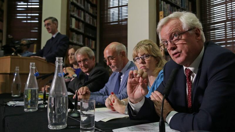 Conservative MP and European Research Group (ERG) chairman Jacob Rees-Mogg (L) listens as Britain’s former secretary of state for Exiting the European Union (Brexit Minister) David Davis (R) speaks during a meeting in London today. Photograph: Daniel Leal- Olivas/AFP/Getty Images