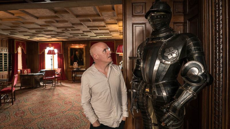 Conor Pope squares up to a suit of armour. Photograph: Keith Heneghan/Phocus