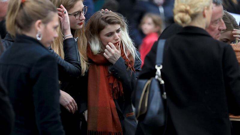 Eileen Battersby’s daughter Nadia among  grieving mourners. Photograph Donall Farmer