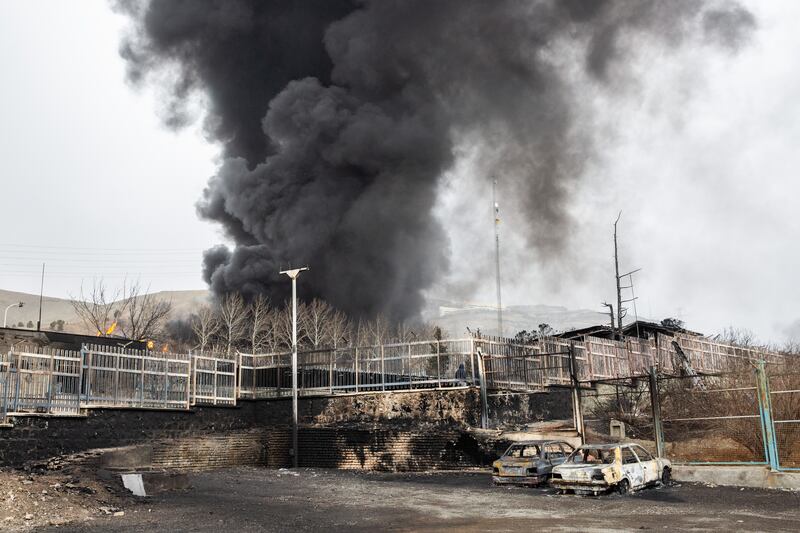 A plume of smoke rises from an oil storage site struck by Israel-led bombing in Tehran. Photograph: The New York Times